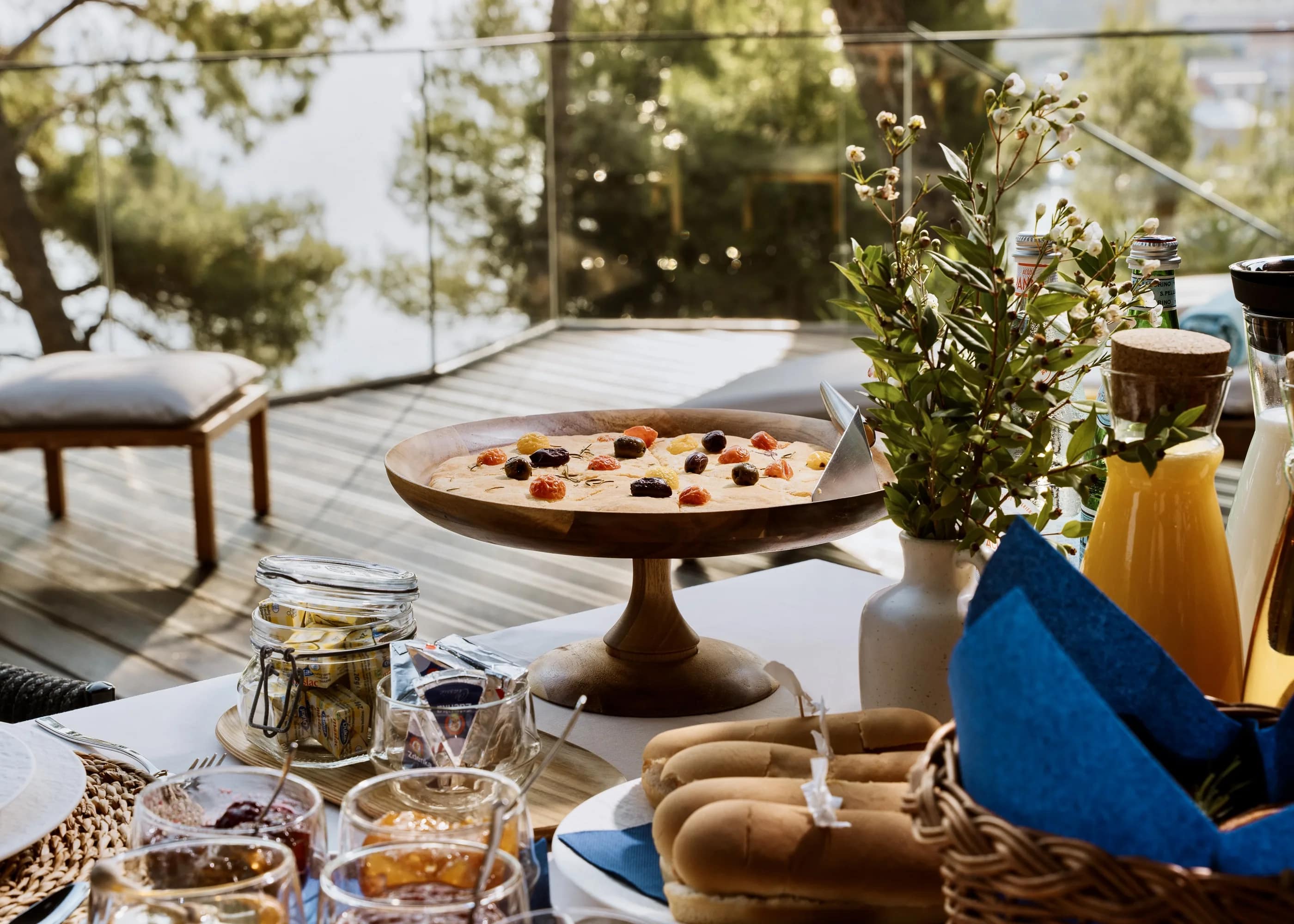 Breakfast laid out — pastries, jams and juices