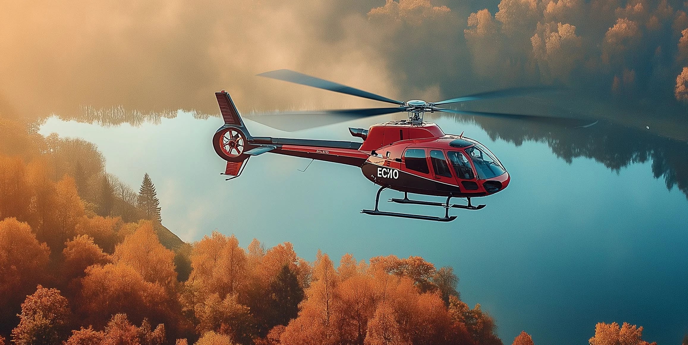 A helicopter banking above autumn treetops reflected in a still lake