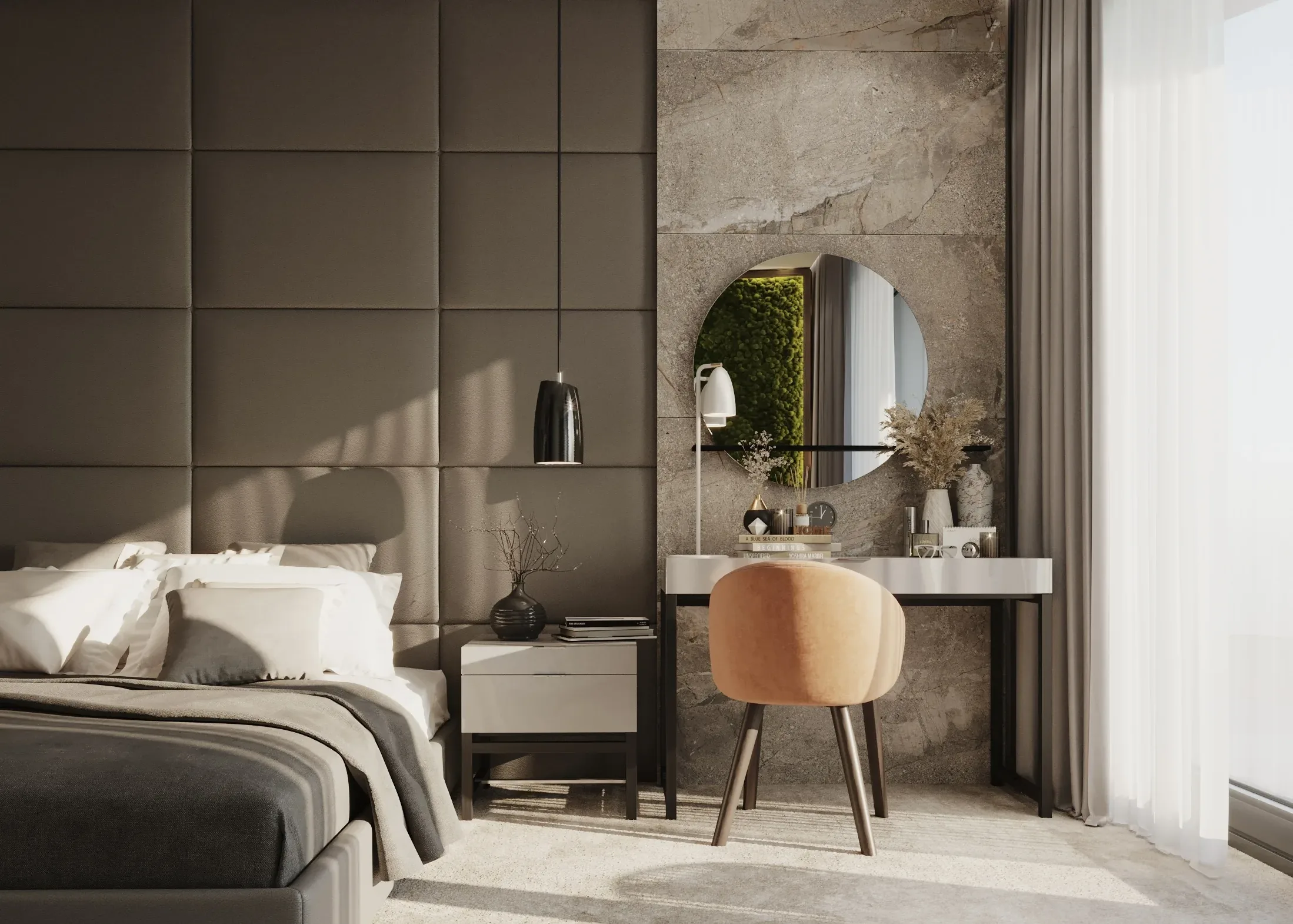 A suite's padded headboard and the round mirror set into the stone wall above the vanity